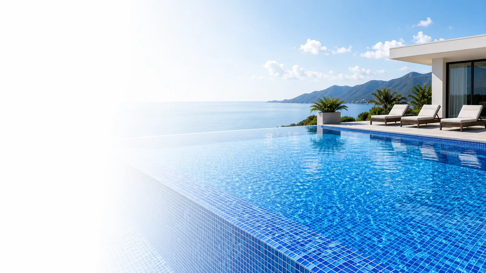 Blue mosaic reinforced PVC liner installed in a modern swimming pool